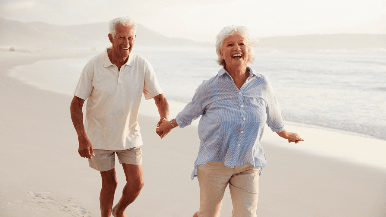 Seth Stewart, a financial advisor, discussing retirement planning with a couple.