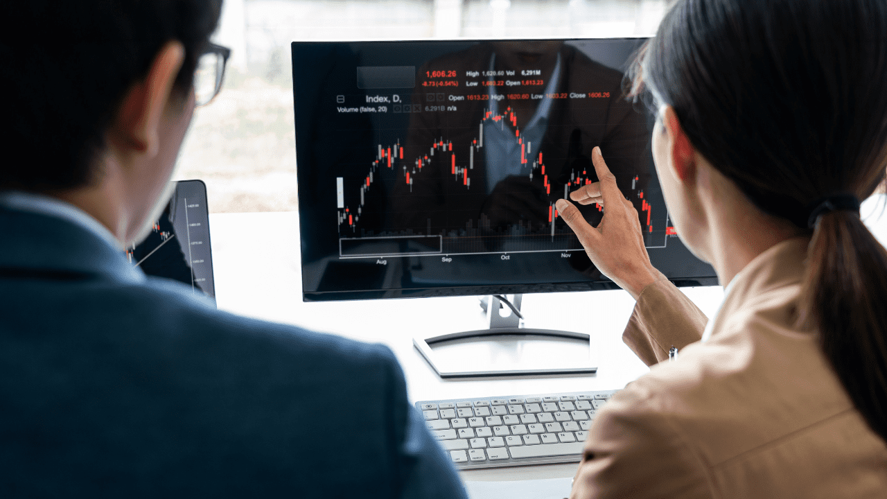 An investor in Jeffersonville, IN, reviewing financial strategies with Brookstone Financial.