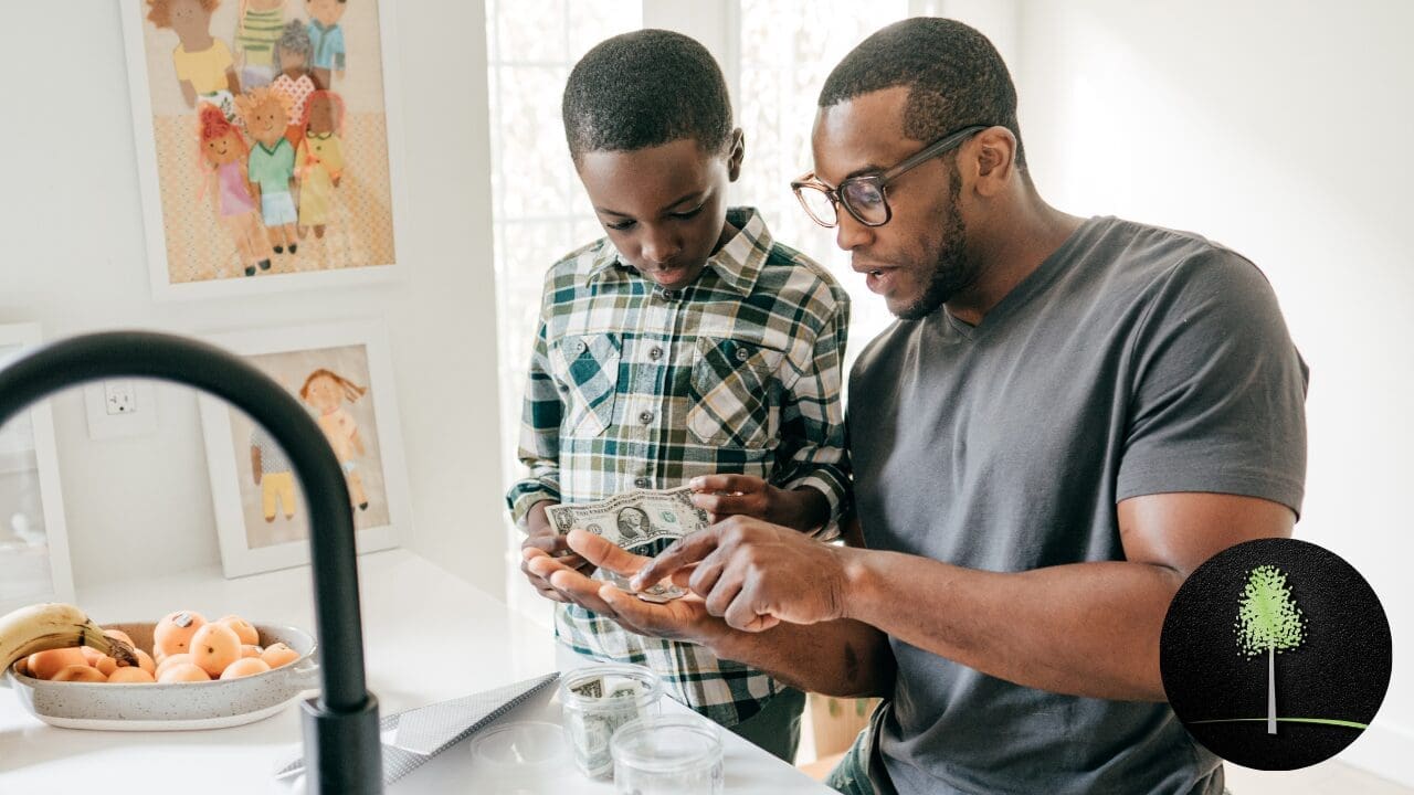 A father explaining finances to his child.