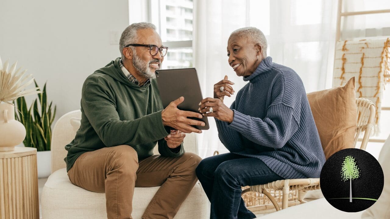 A senior couple reviewing financial plans at their Jeffersonville, Indiana, home, preparing for retirement and future challenges.