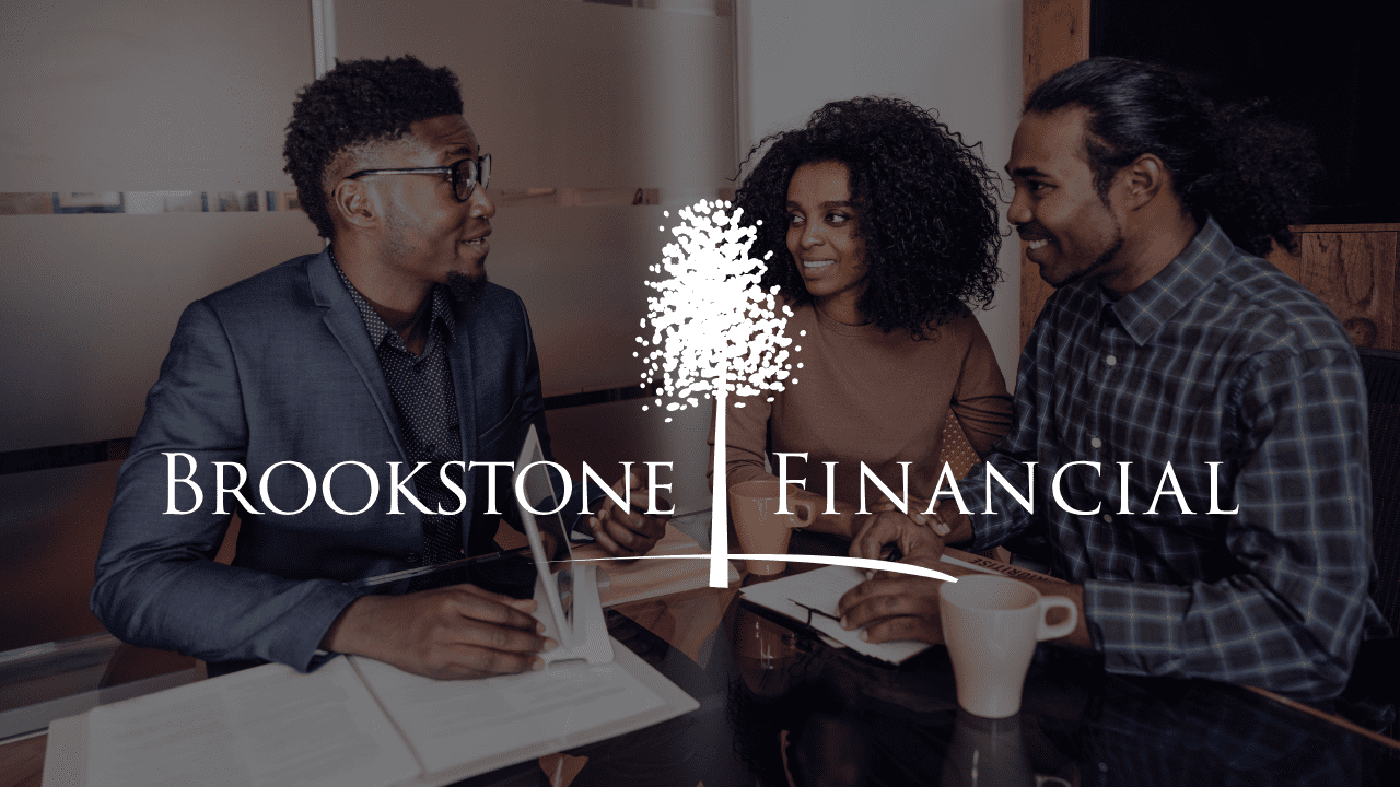 A couple speaking with a financial advisor
